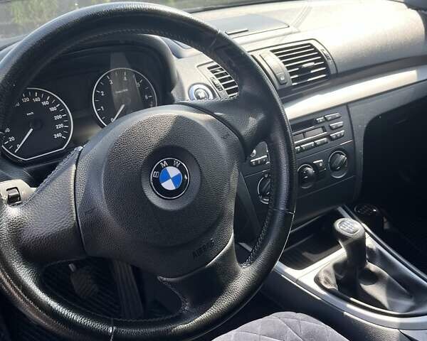 Черный БМВ 1 Серия, объемом двигателя 1.6 л и пробегом 264 тыс. км за 5700 $, фото 1 на Automoto.ua