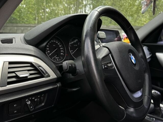 Черный БМВ 1 Серия, объемом двигателя 1.6 л и пробегом 265 тыс. км за 8300 $, фото 5 на Automoto.ua