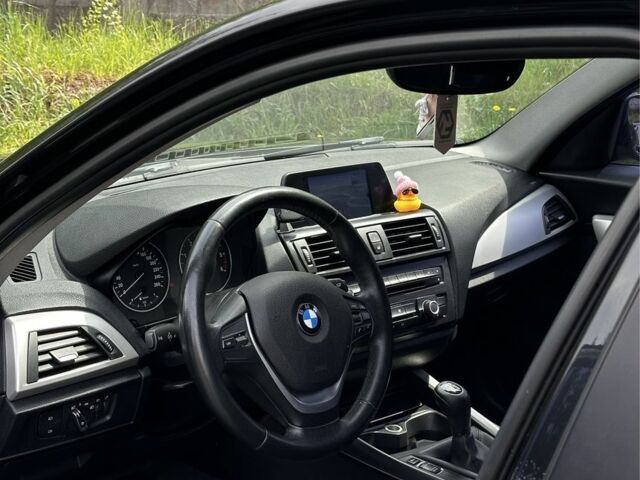 Черный БМВ 1 Серия, объемом двигателя 1.6 л и пробегом 265 тыс. км за 8300 $, фото 1 на Automoto.ua