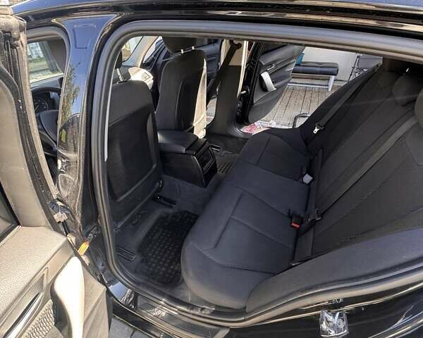Черный БМВ 1 Серия, объемом двигателя 1.6 л и пробегом 347 тыс. км за 8700 $, фото 1 на Automoto.ua