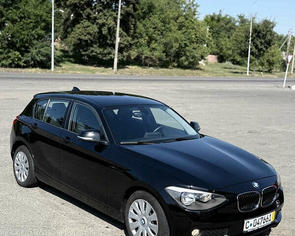 Черный БМВ 1 Серия, объемом двигателя 1.6 л и пробегом 125 тыс. км за 11500 $, фото 1 на Automoto.ua