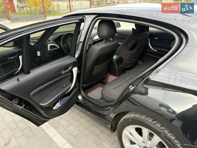 Черный БМВ 1 Серия, объемом двигателя 2 л и пробегом 196 тыс. км за 10400 $, фото 14 на Automoto.ua