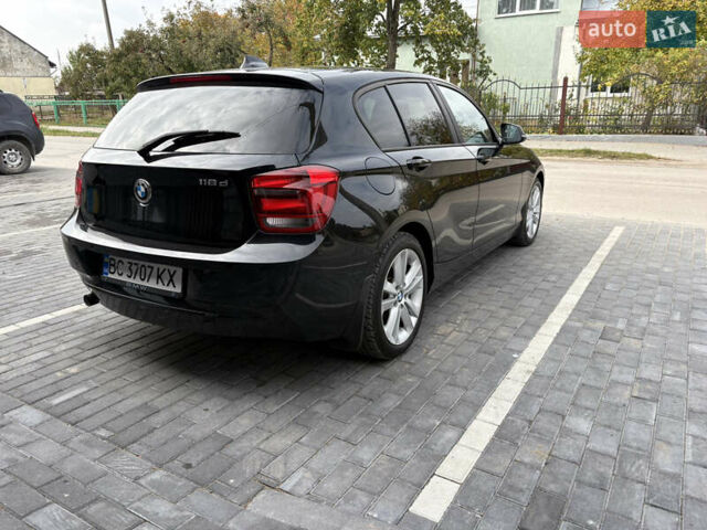 Черный БМВ 1 Серия, объемом двигателя 2 л и пробегом 196 тыс. км за 10400 $, фото 9 на Automoto.ua