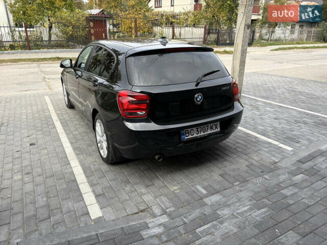 Черный БМВ 1 Серия, объемом двигателя 2 л и пробегом 196 тыс. км за 10400 $, фото 7 на Automoto.ua