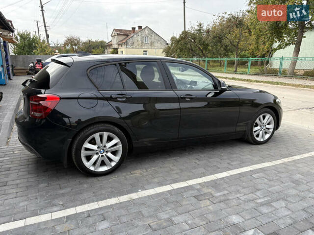 Черный БМВ 1 Серия, объемом двигателя 2 л и пробегом 196 тыс. км за 10400 $, фото 6 на Automoto.ua