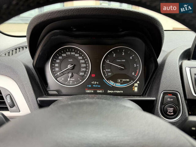 Черный БМВ 1 Серия, объемом двигателя 1.5 л и пробегом 156 тыс. км за 13600 $, фото 16 на Automoto.ua