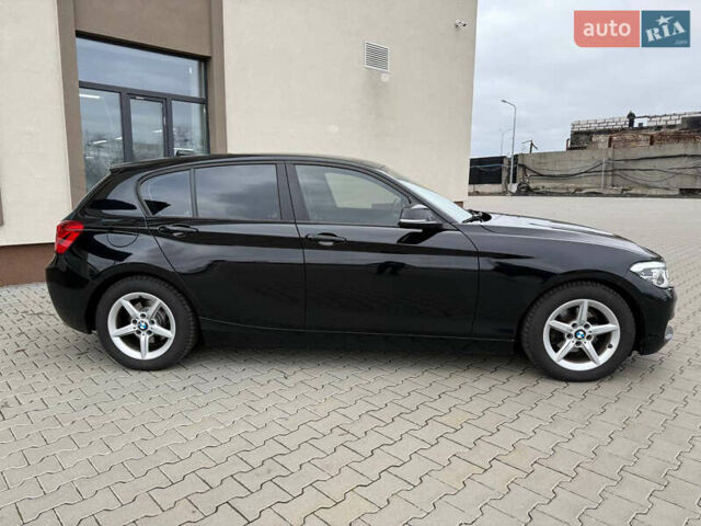 Черный БМВ 1 Серия, объемом двигателя 1.5 л и пробегом 156 тыс. км за 13600 $, фото 2 на Automoto.ua