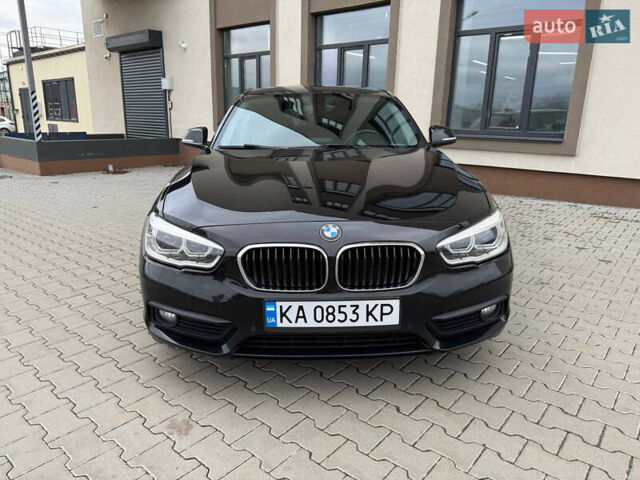 Черный БМВ 1 Серия, объемом двигателя 1.5 л и пробегом 156 тыс. км за 13600 $, фото 1 на Automoto.ua