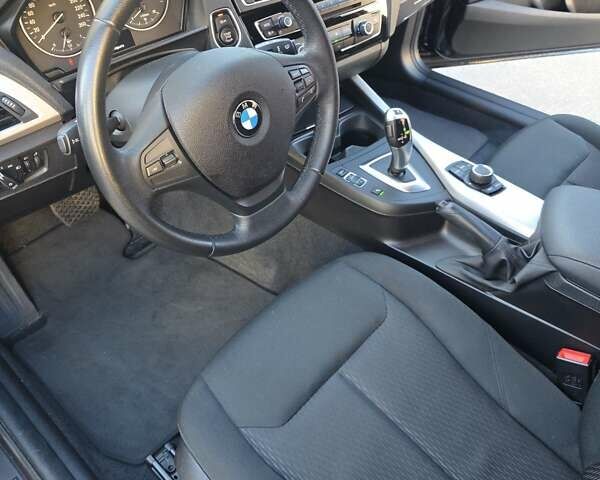 Черный БМВ 1 Серия, объемом двигателя 1.5 л и пробегом 94 тыс. км за 14500 $, фото 14 на Automoto.ua