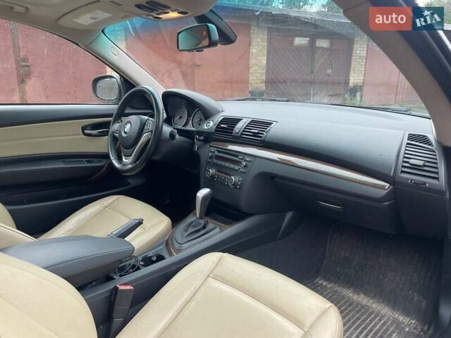 Черный БМВ 1 Серия, объемом двигателя 3 л и пробегом 185 тыс. км за 8399 $, фото 1 на Automoto.ua