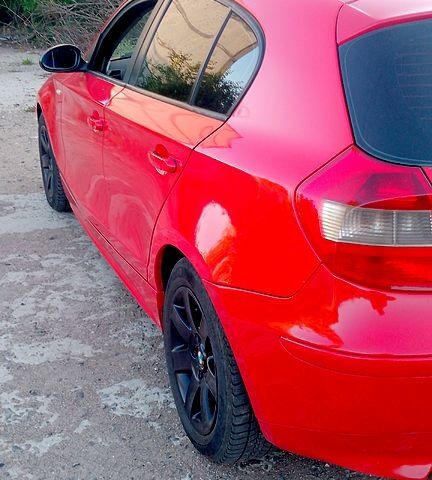 Красный БМВ 1 Серия, объемом двигателя 2 л и пробегом 256 тыс. км за 5500 $, фото 5 на Automoto.ua