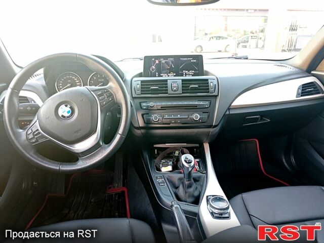 Красный БМВ 1 Серия, объемом двигателя 1.6 л и пробегом 99 тыс. км за 9500 $, фото 6 на Automoto.ua