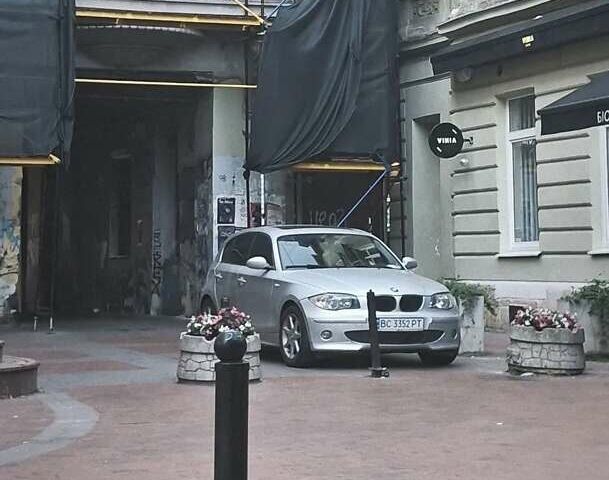 Серый БМВ 1 Серия, объемом двигателя 2 л и пробегом 239 тыс. км за 6300 $, фото 1 на Automoto.ua