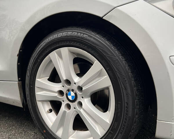 Серый БМВ 1 Серия, объемом двигателя 2 л и пробегом 312 тыс. км за 6200 $, фото 9 на Automoto.ua