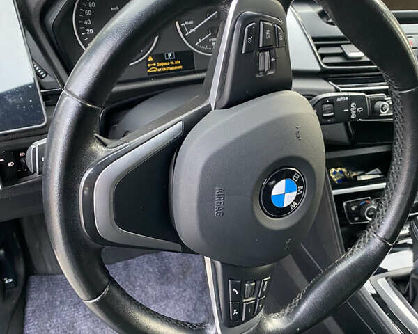 Черный БМВ 2 Серия, объемом двигателя 1.5 л и пробегом 149 тыс. км за 12600 $, фото 9 на Automoto.ua