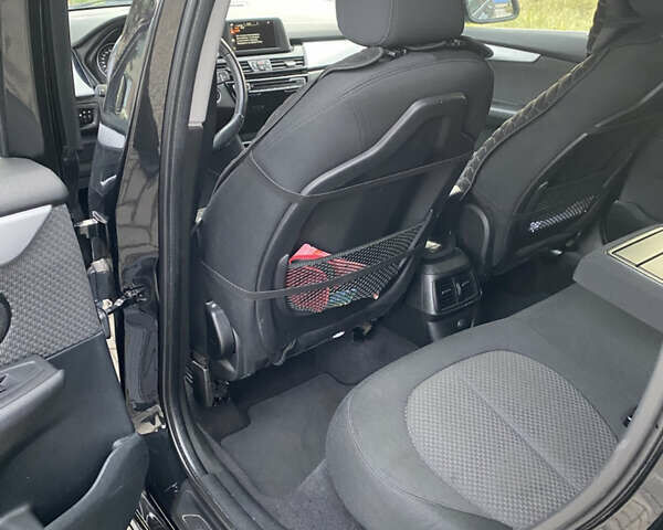 Черный БМВ 2 Серия, объемом двигателя 1.5 л и пробегом 149 тыс. км за 12600 $, фото 7 на Automoto.ua