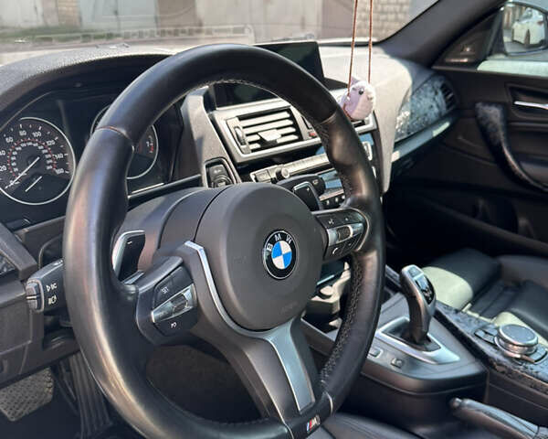 Серый БМВ 2 Серия, объемом двигателя 3 л и пробегом 122 тыс. км за 28000 $, фото 16 на Automoto.ua