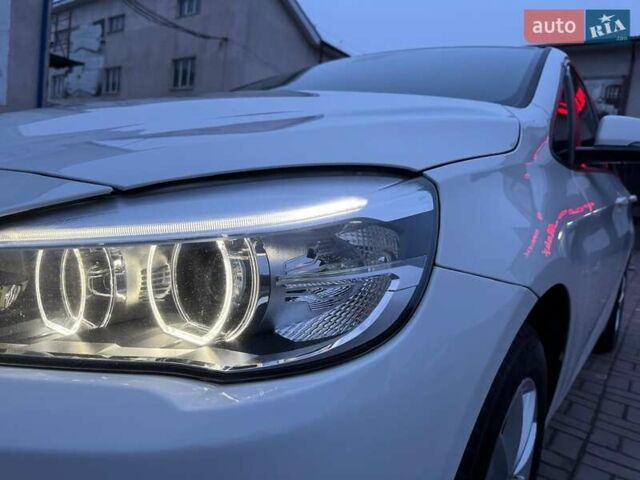 Белый БМВ 2 Series Active Tourer, объемом двигателя 2 л и пробегом 156 тыс. км за 15200 $, фото 11 на Automoto.ua