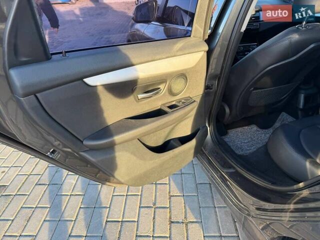 Серый БМВ 2 Series Active Tourer, объемом двигателя 2 л и пробегом 132 тыс. км за 13500 $, фото 14 на Automoto.ua