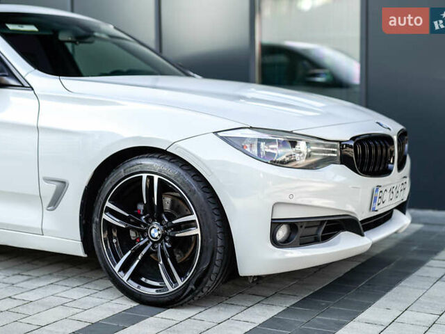 Білий БМВ 3 Серія ГТ, об'ємом двигуна 2 л та пробігом 172 тис. км за 17200 $, фото 4 на Automoto.ua