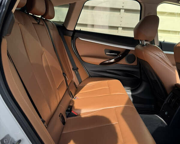 Белый БМВ 3 Серия ГТ, объемом двигателя 2 л и пробегом 230 тыс. км за 18500 $, фото 4 на Automoto.ua