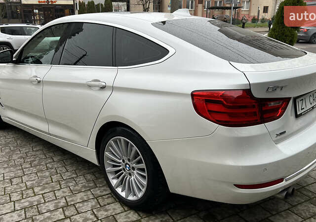 Білий БМВ 3 Серія ГТ, об'ємом двигуна 2 л та пробігом 160 тис. км за 13700 $, фото 4 на Automoto.ua