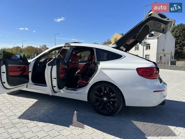 Білий БМВ 3 Серія ГТ, об'ємом двигуна 2 л та пробігом 125 тис. км за 20000 $, фото 9 на Automoto.ua
