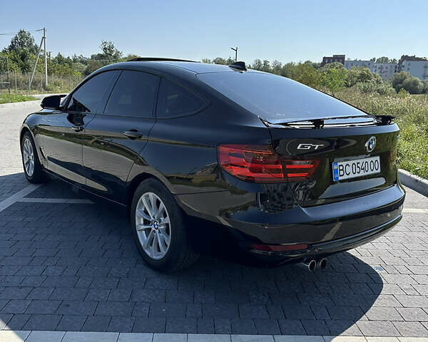 Черный БМВ 3 Серия ГТ, объемом двигателя 2 л и пробегом 181 тыс. км за 13700 $, фото 3 на Automoto.ua