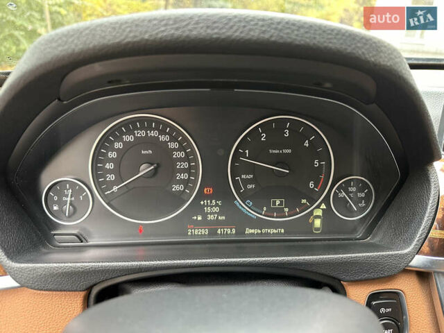 Чорний БМВ 3 Серія ГТ, об'ємом двигуна 2 л та пробігом 218 тис. км за 13750 $, фото 6 на Automoto.ua