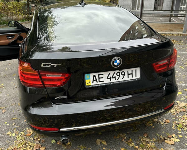 Чорний БМВ 3 Серія ГТ, об'ємом двигуна 2 л та пробігом 218 тис. км за 13750 $, фото 1 на Automoto.ua