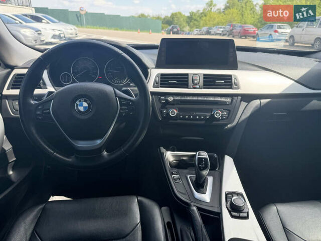 Черный БМВ 3 Серия ГТ, объемом двигателя 2 л и пробегом 230 тыс. км за 12500 $, фото 13 на Automoto.ua