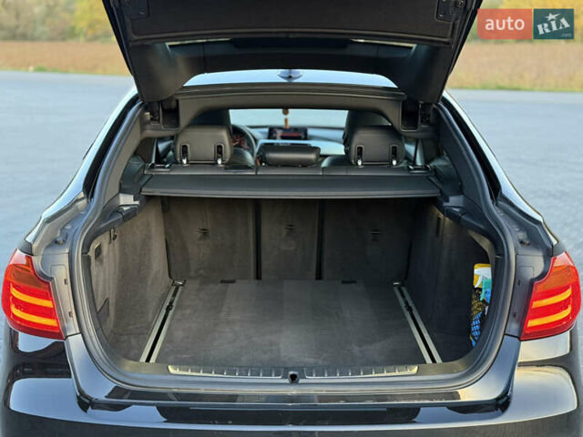 Черный БМВ 3 Серия ГТ, объемом двигателя 2 л и пробегом 275 тыс. км за 18850 $, фото 22 на Automoto.ua