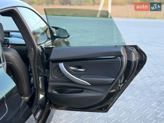 Черный БМВ 3 Серия ГТ, объемом двигателя 2 л и пробегом 275 тыс. км за 18850 $, фото 24 на Automoto.ua