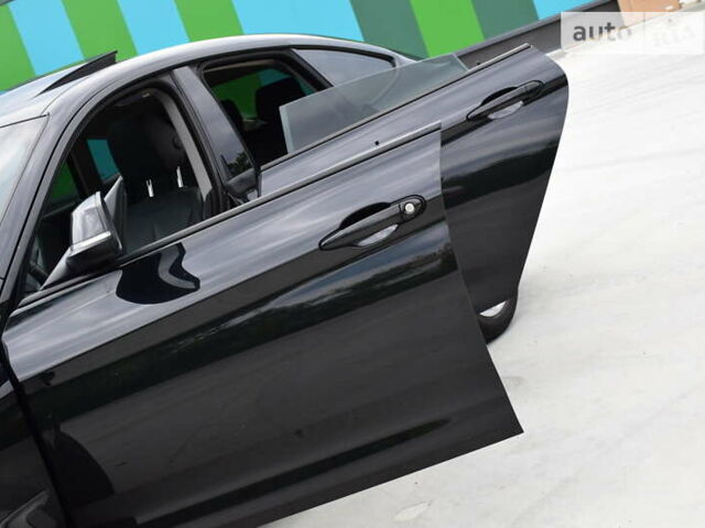 Черный БМВ 3 Серия ГТ, объемом двигателя 2 л и пробегом 230 тыс. км за 13999 $, фото 31 на Automoto.ua
