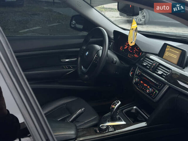 Чорний БМВ 3 Серія ГТ, об'ємом двигуна 2 л та пробігом 124 тис. км за 12999 $, фото 1 на Automoto.ua
