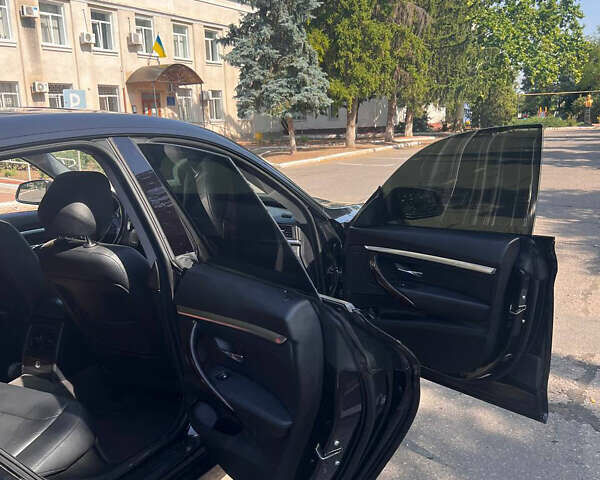 Черный БМВ 3 Серия ГТ, объемом двигателя 2 л и пробегом 194 тыс. км за 13699 $, фото 8 на Automoto.ua