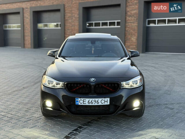 Черный БМВ 3 Серия ГТ, объемом двигателя 2 л и пробегом 275 тыс. км за 18850 $, фото 1 на Automoto.ua