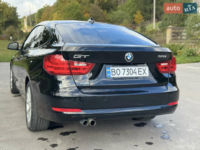 Черный БМВ 3 Серия ГТ, объемом двигателя 2 л и пробегом 215 тыс. км за 13299 $, фото 53 на Automoto.ua