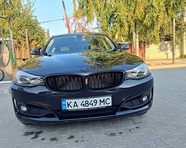 Черный БМВ 3 Серия ГТ, объемом двигателя 2 л и пробегом 227 тыс. км за 17299 $, фото 4 на Automoto.ua