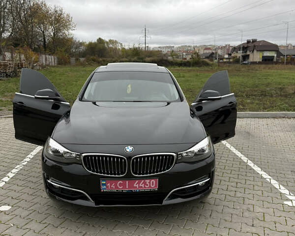Чорний БМВ 3 Серія ГТ, об'ємом двигуна 2 л та пробігом 124 тис. км за 13999 $, фото 1 на Automoto.ua