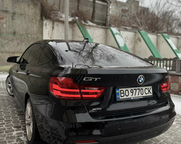 Черный БМВ 3 Серия ГТ, объемом двигателя 2 л и пробегом 103 тыс. км за 15500 $, фото 6 на Automoto.ua