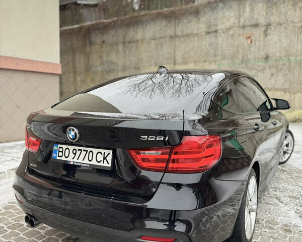 Черный БМВ 3 Серия ГТ, объемом двигателя 2 л и пробегом 103 тыс. км за 15500 $, фото 4 на Automoto.ua