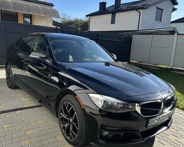 Чорний БМВ 3 Серія ГТ, об'ємом двигуна 2 л та пробігом 122 тис. км за 16500 $, фото 1 на Automoto.ua