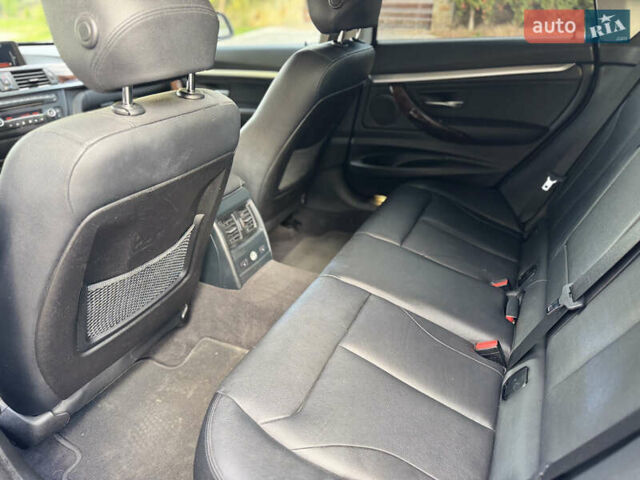 Черный БМВ 3 Серия ГТ, объемом двигателя 2 л и пробегом 215 тыс. км за 13299 $, фото 115 на Automoto.ua