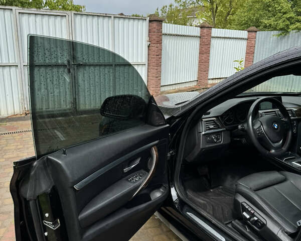 Чорний БМВ 3 Серія ГТ, об'ємом двигуна 2 л та пробігом 129 тис. км за 18900 $, фото 10 на Automoto.ua