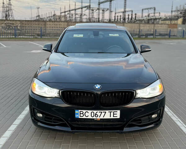 Чорний БМВ 3 Серія ГТ, об'ємом двигуна 2 л та пробігом 129 тис. км за 18900 $, фото 1 на Automoto.ua