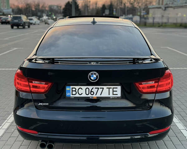 Чорний БМВ 3 Серія ГТ, об'ємом двигуна 2 л та пробігом 129 тис. км за 18900 $, фото 4 на Automoto.ua