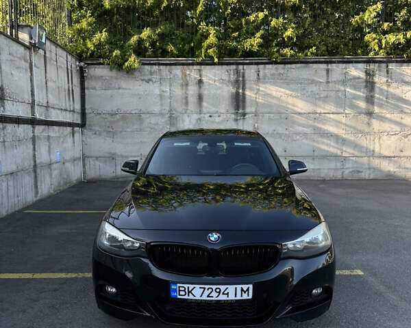 Чорний БМВ 3 Серія ГТ, об'ємом двигуна 2 л та пробігом 170 тис. км за 14800 $, фото 1 на Automoto.ua