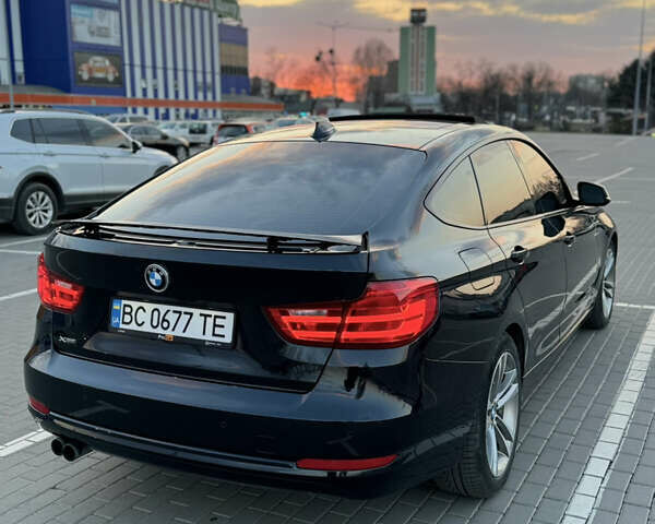 Чорний БМВ 3 Серія ГТ, об'ємом двигуна 2 л та пробігом 129 тис. км за 18900 $, фото 5 на Automoto.ua