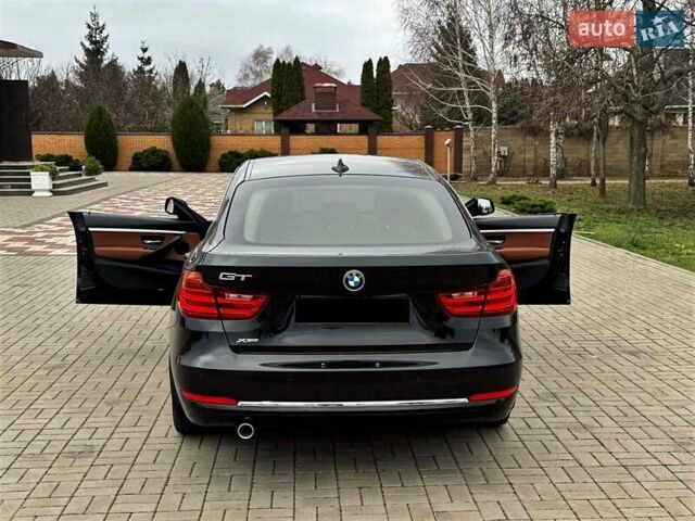 Черный БМВ 3 Серия ГТ, объемом двигателя 2 л и пробегом 174 тыс. км за 18900 $, фото 2 на Automoto.ua